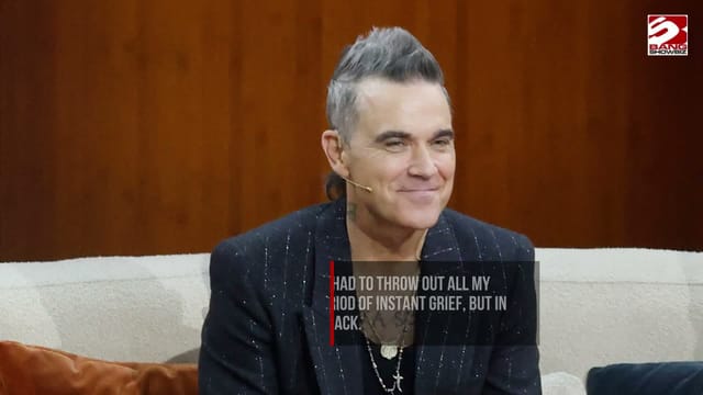 Robbie Williams has become 'addicted' to clothes after giving up drink and drugs