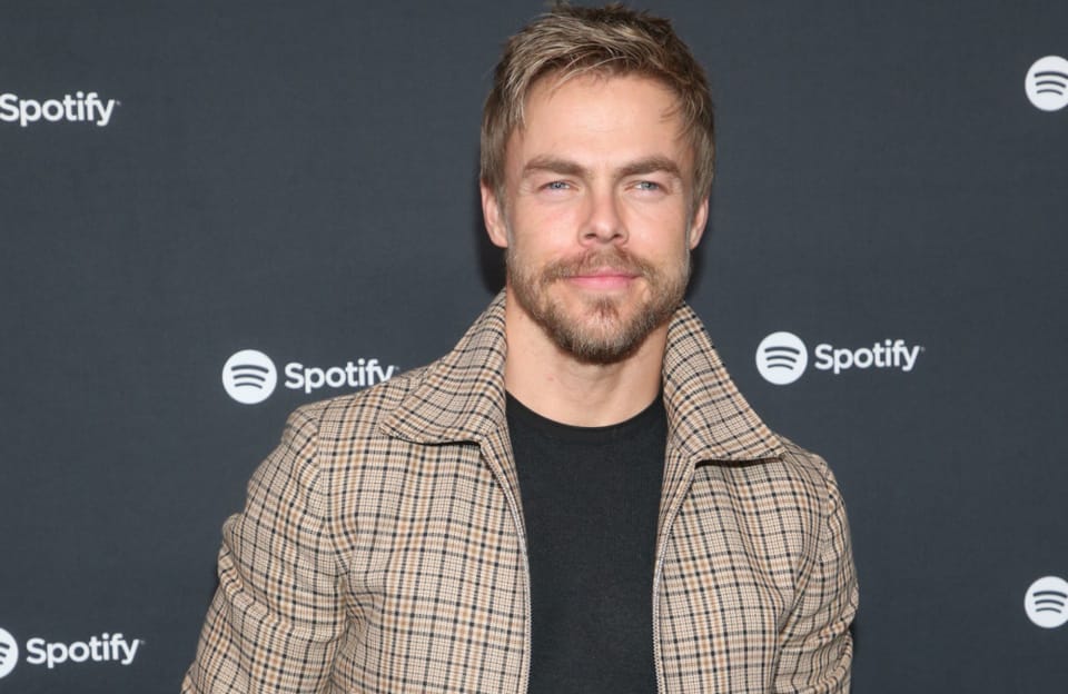Derek Hough pays heartfelt tribute to beloved dog Romie following his death