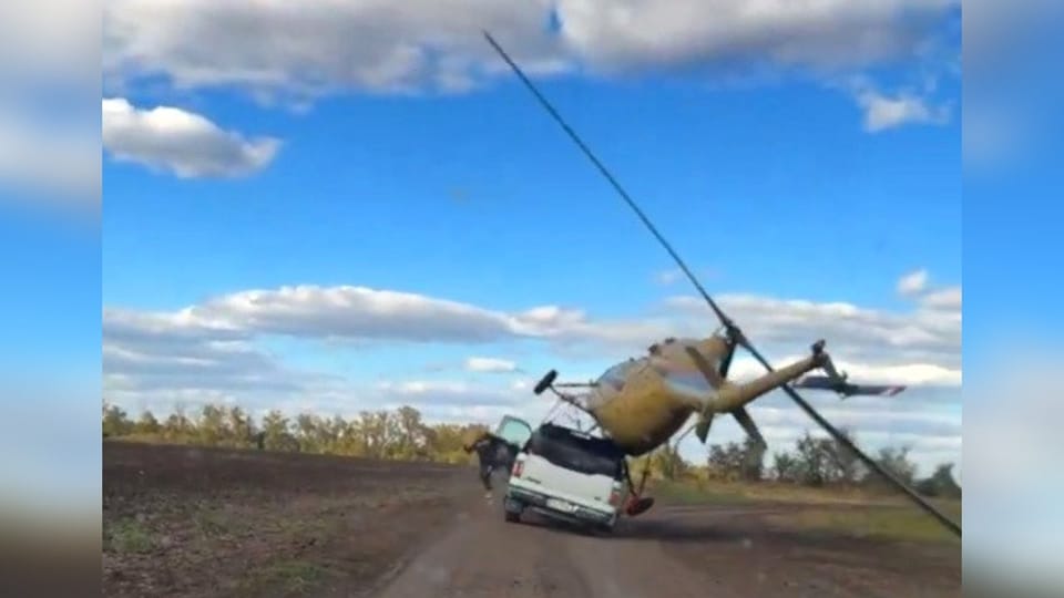 Helicopter falls off car roof: Russian video goes viral
